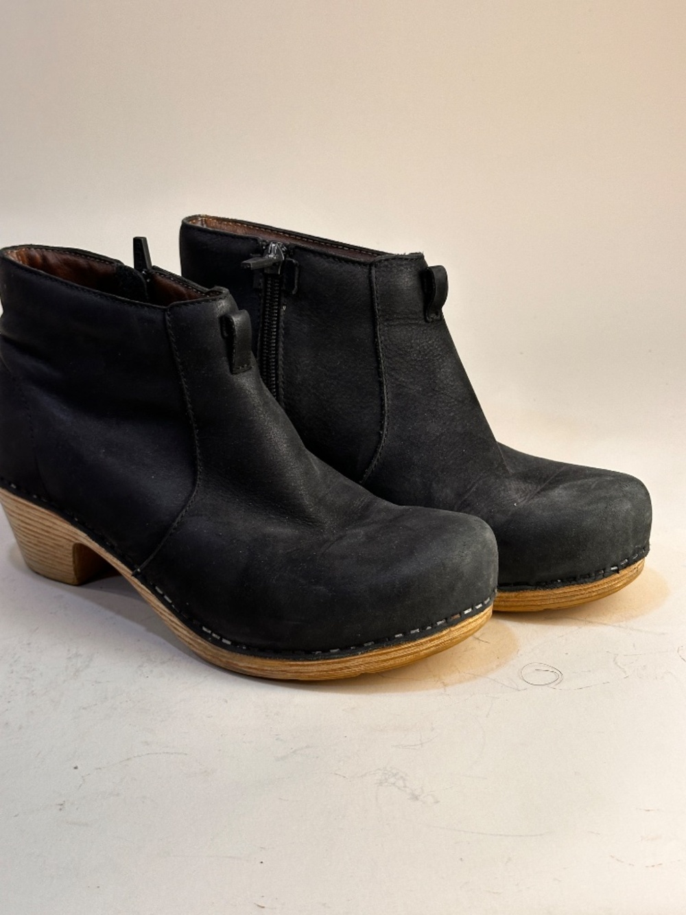 Black leather Dansko boots with zipper